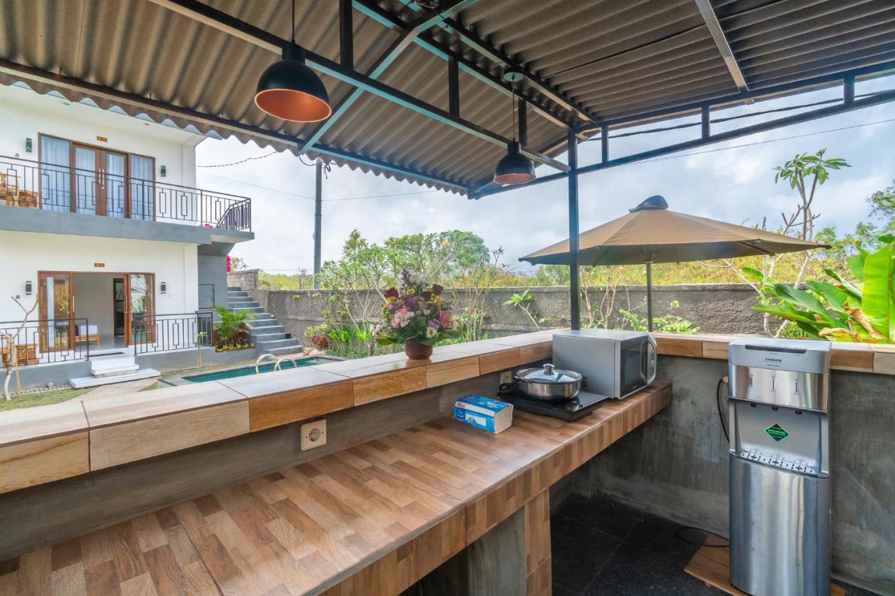 Wooden Puri Guesthouse أُلُواتو المظهر الخارجي الصورة