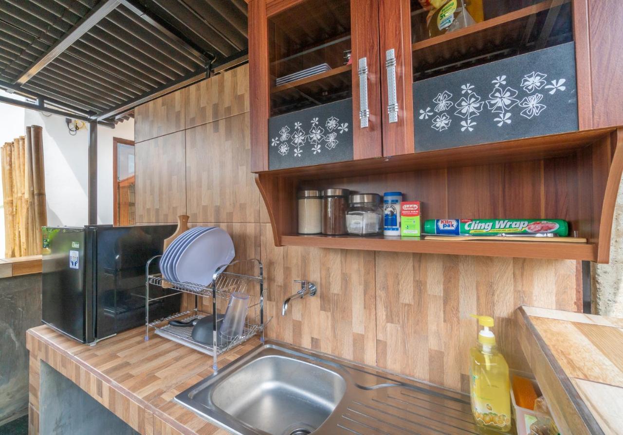 Wooden Puri Guesthouse أُلُواتو المظهر الخارجي الصورة