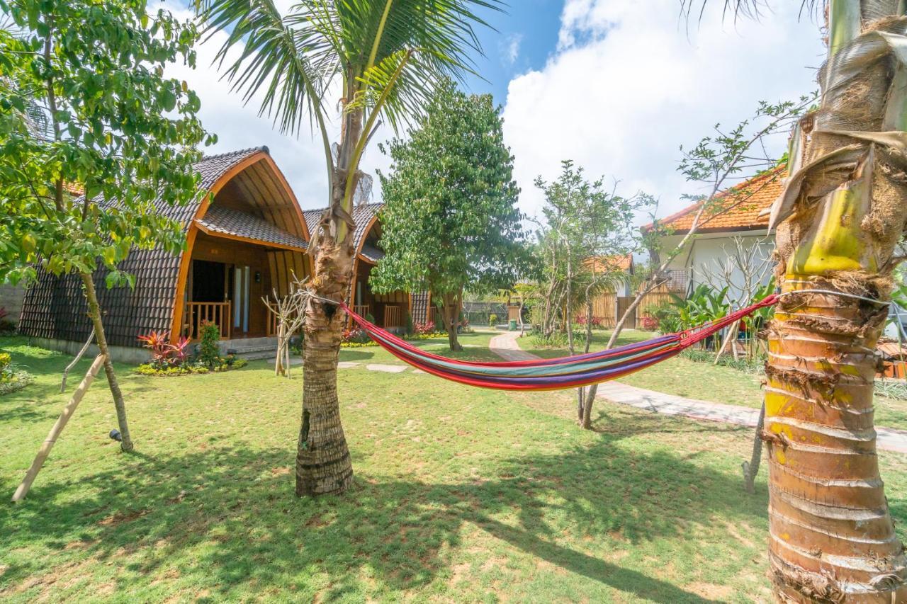 Wooden Puri Guesthouse أُلُواتو المظهر الخارجي الصورة